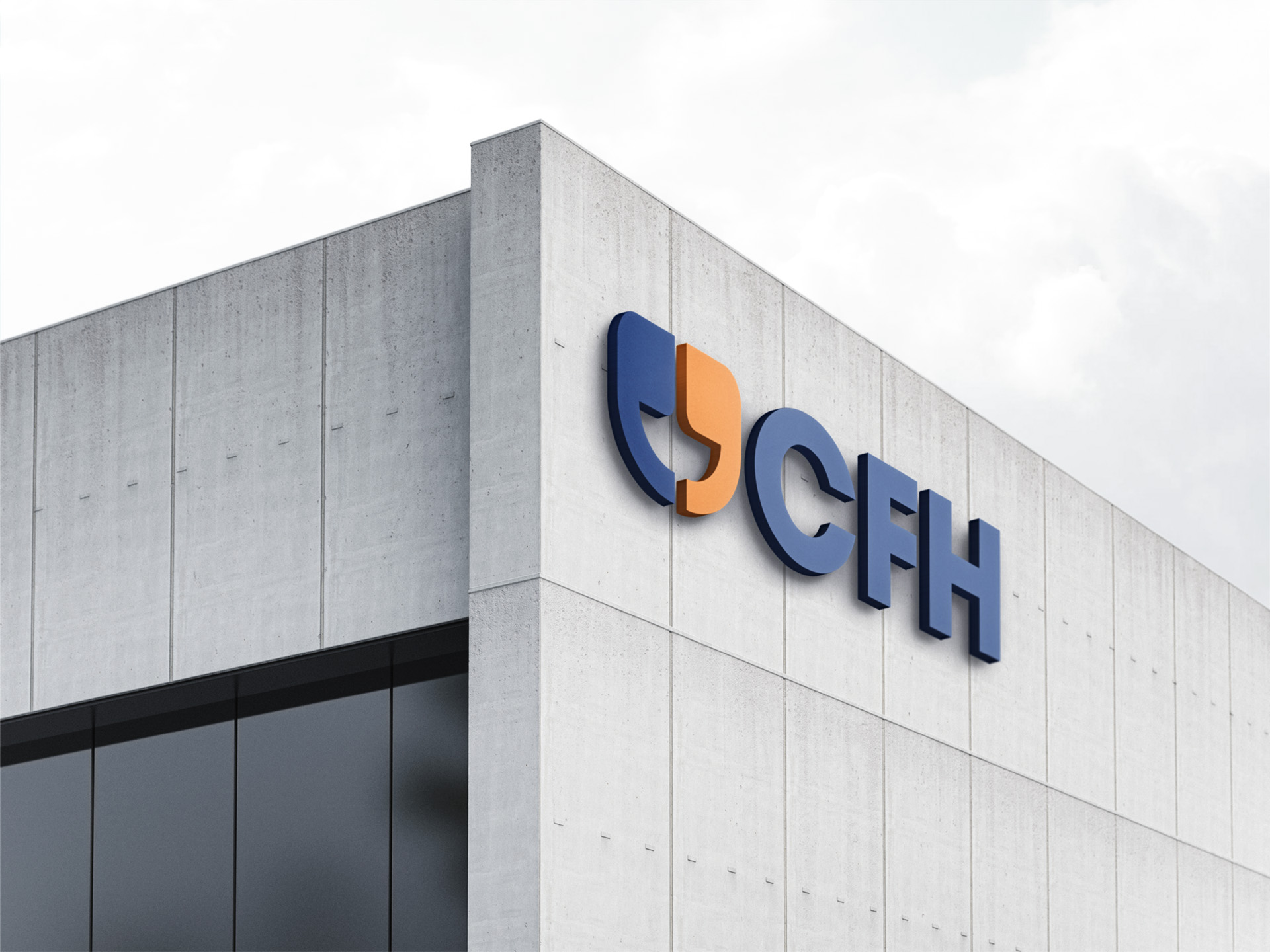 Image showing CFH logo on a wall of their office in an outside environment.