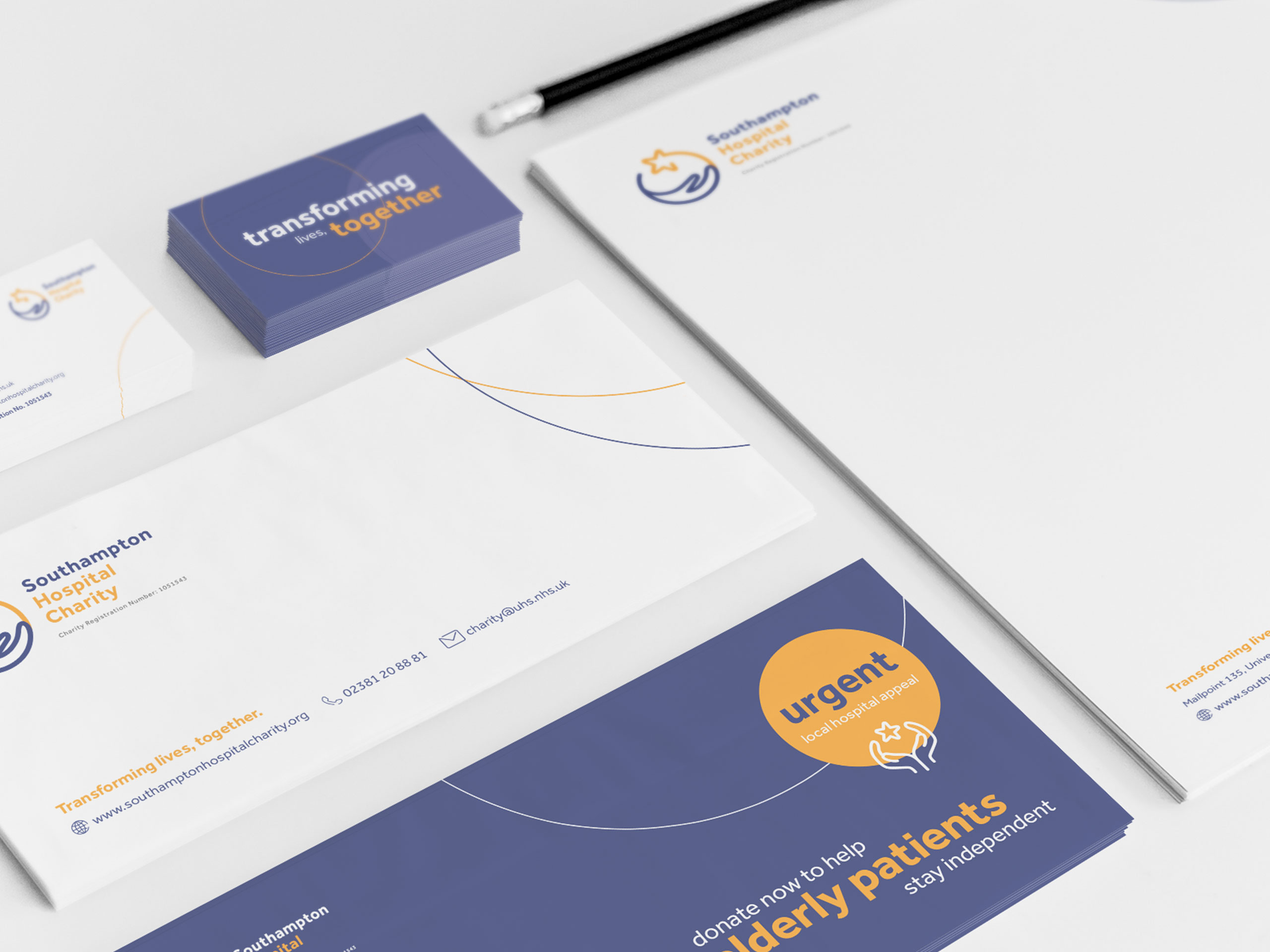 An image to show stationery in the new brand style; letterheads, comp slips and business cards.