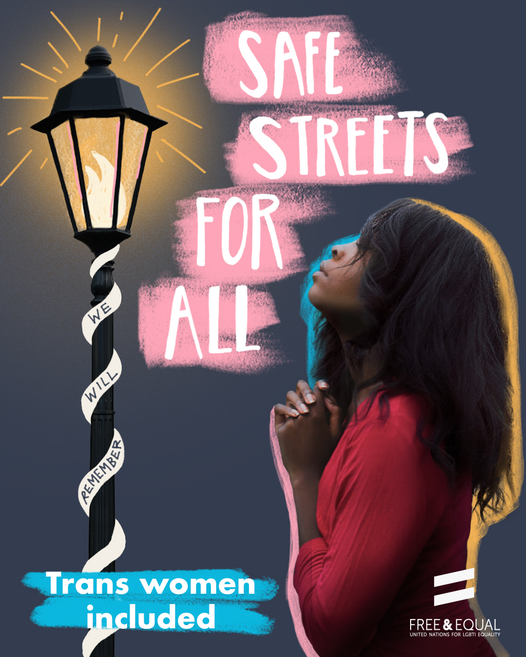 An image of a trans woman standing under a street light.